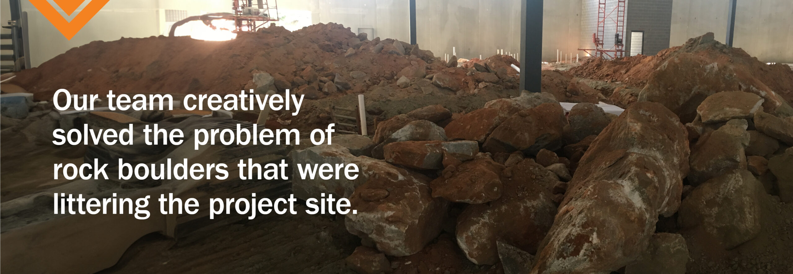 Design-Build Solutions: Our team creatively solved the problem of rock boulders that were littering the project site.
