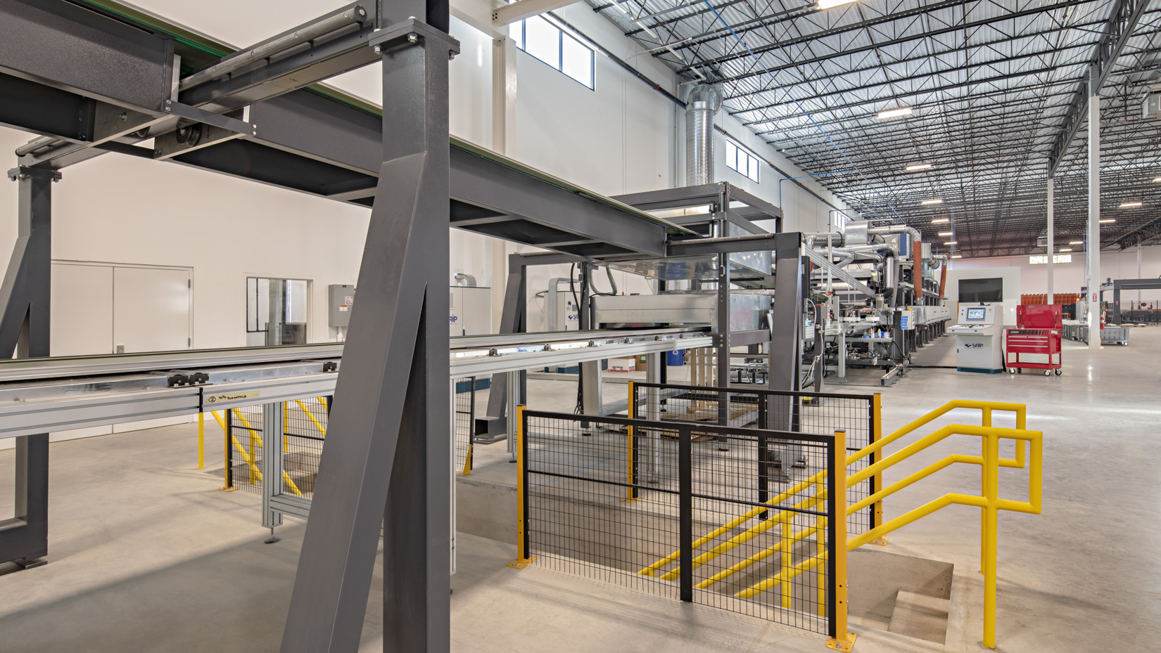 Smart design protects industrial facility occupants. At TrueCore’s South Carolina manufacturing facility, we designed circulation components, including stairs, for easier, safer and quicker access to different stretches of the production line.